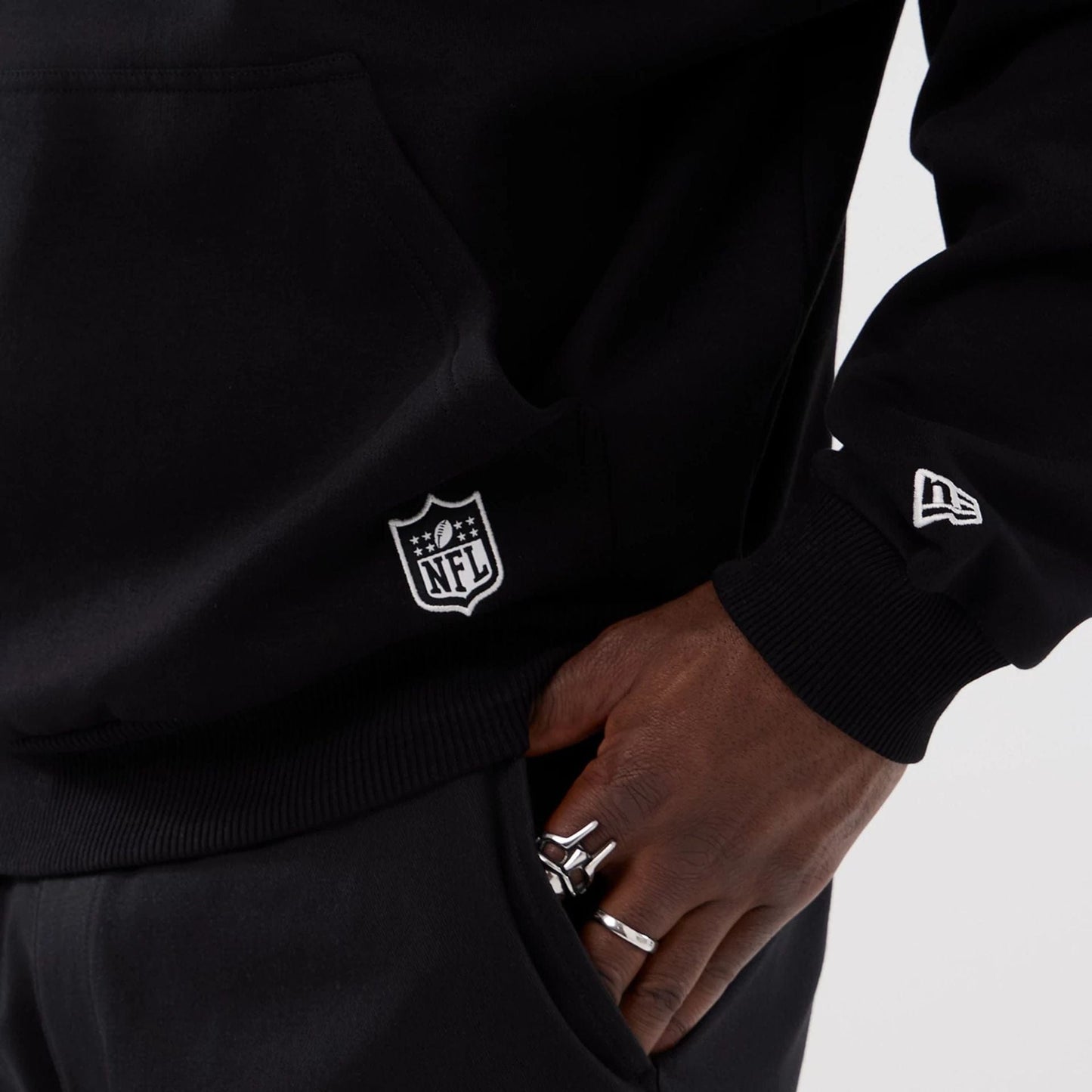 The Male model is wearing Atlanta Falcons NFL International Series Games 2025 Black Premium Pullover Hoodie  5