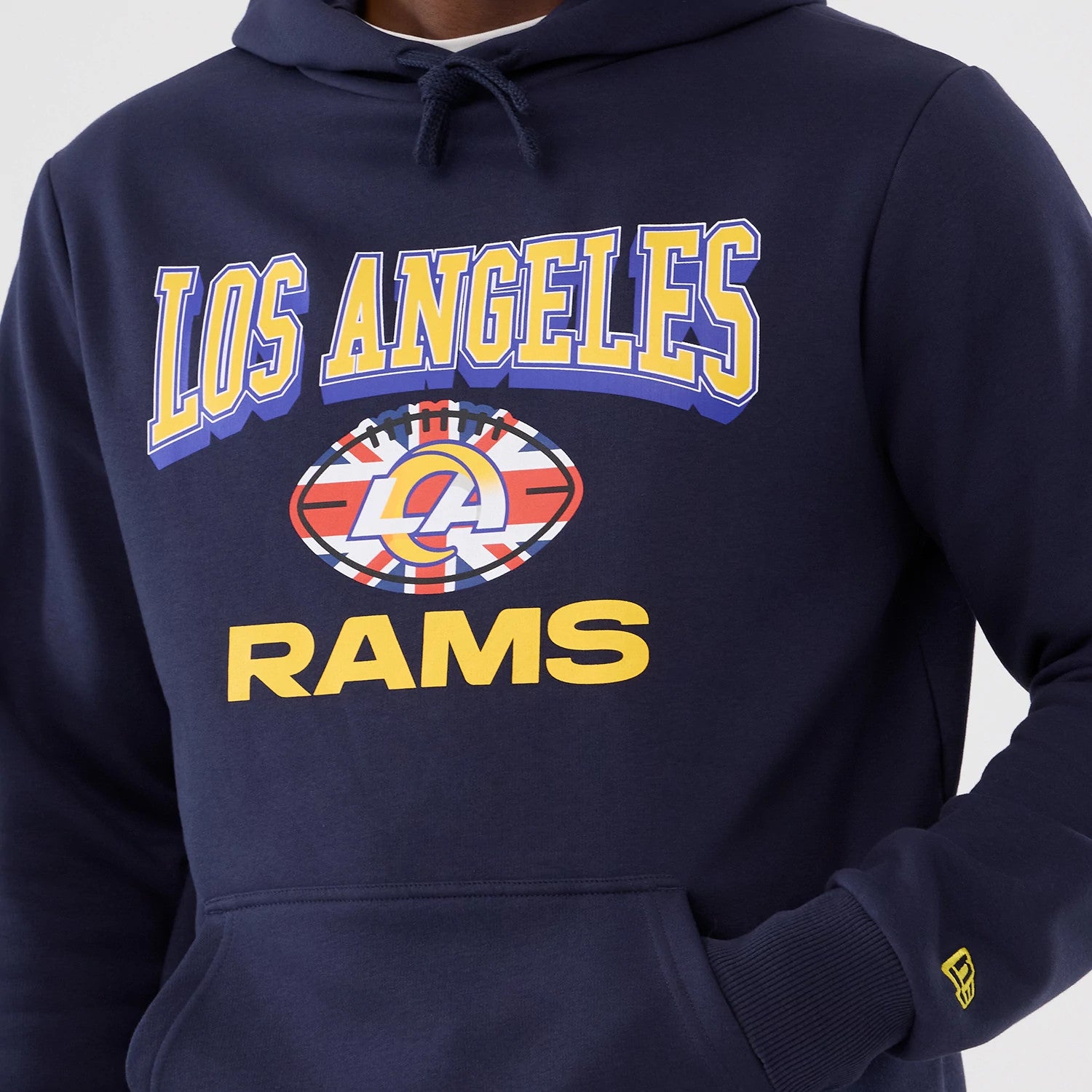 The Male model is wearing LA Rams NFL International Series Games 2025 Navy Pullover Hoodie 3