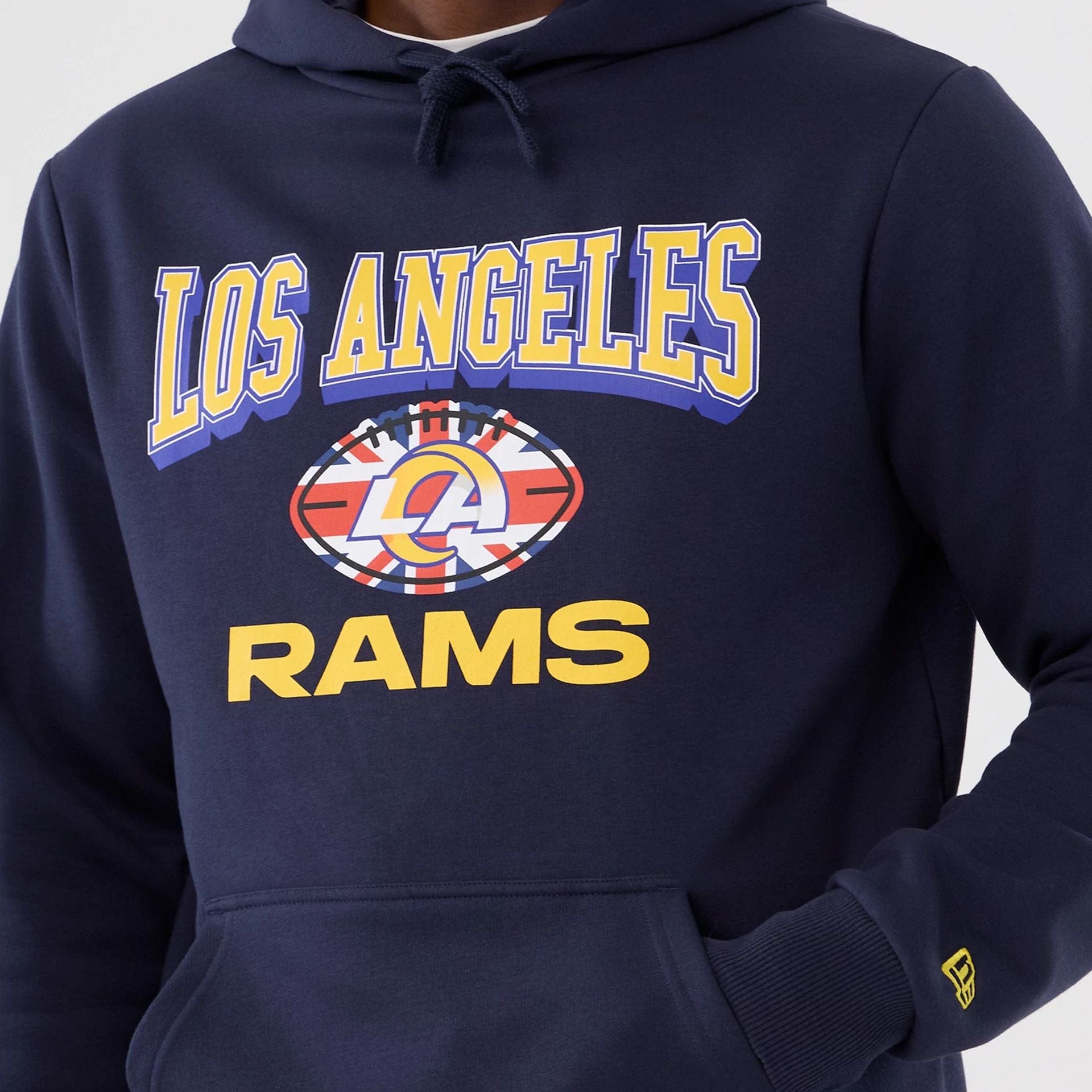 The Male model is wearing LA Rams NFL International Series Games 2025 Navy Pullover Hoodie  3