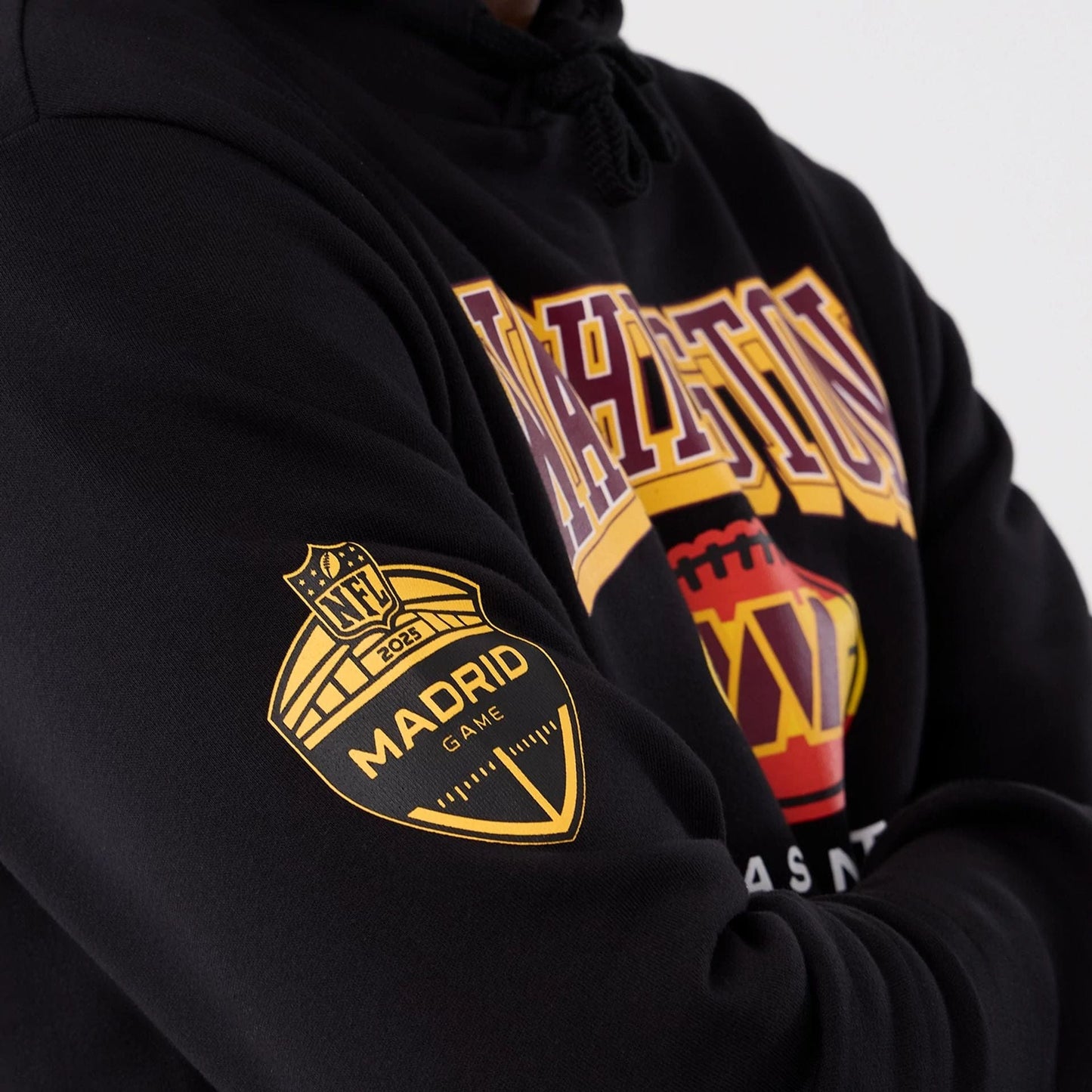 The Male model is wearing Washington Commanders NFL International Series Games 2025 Black Pullover Hoodie  5