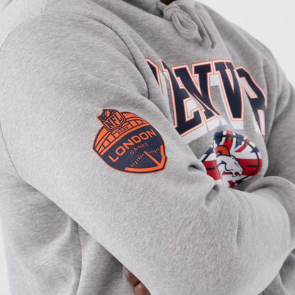 The Male model is wearing Denver Broncos NFL International Series Games 2025 Grey Pullover Hoodie  4