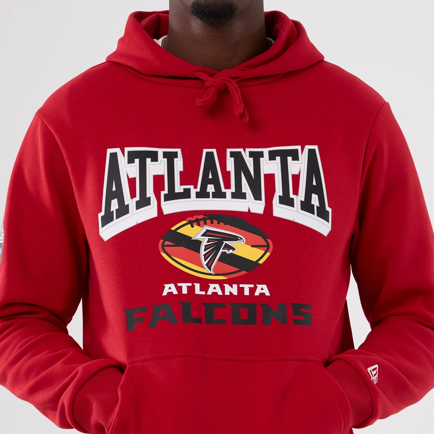 The Male model is wearing Atlanta Falcons NFL International Series Games 2025 Red Pullover Hoodie 6