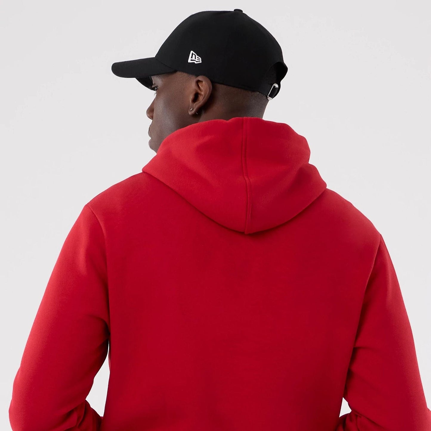 The Male model is wearing Atlanta Falcons NFL International Series Games 2025 Red Pullover Hoodie  7