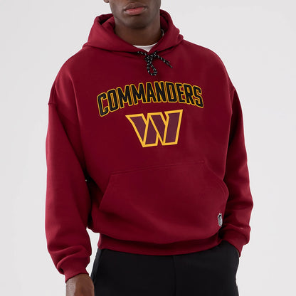 The Male model is wearing Washington Commanders NFL International Series Games 2025 Dark Red Premium Pullover Hoodie 7