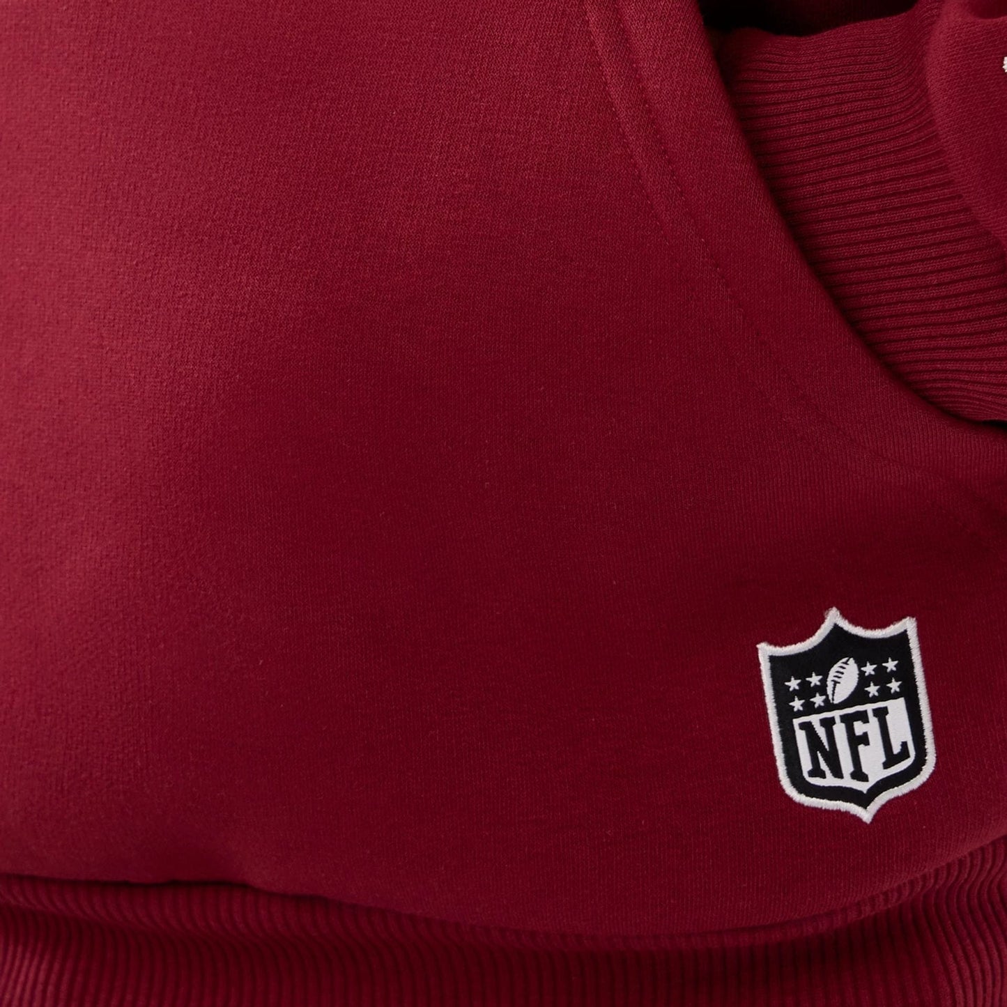 The Male model is wearing Washington Commanders NFL International Series Games 2025 Dark Red Premium Pullover Hoodie  4