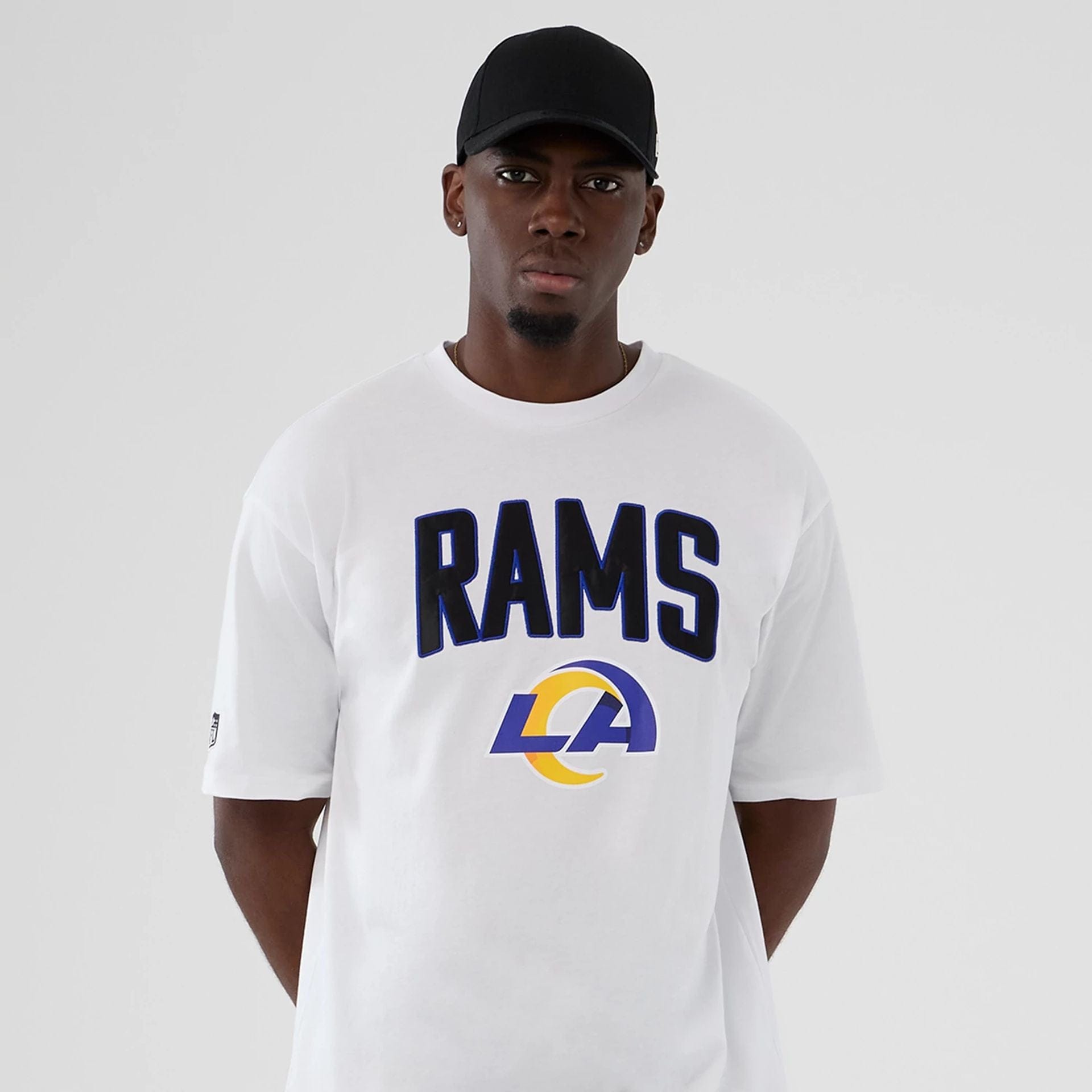 The Male model is wearing LA Rams NFL International Series Games 2025 White Premium T-Shirt  7