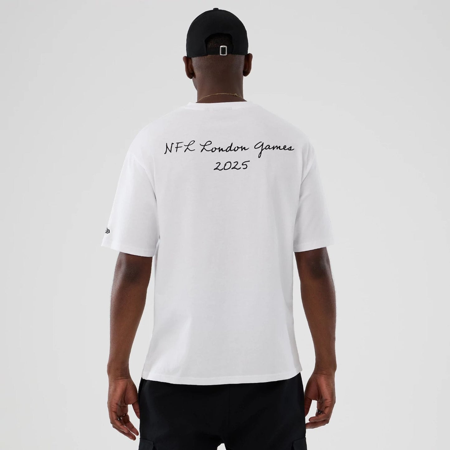 The Male model is wearing LA Rams NFL International Series Games 2025 White Premium T-Shirt 2