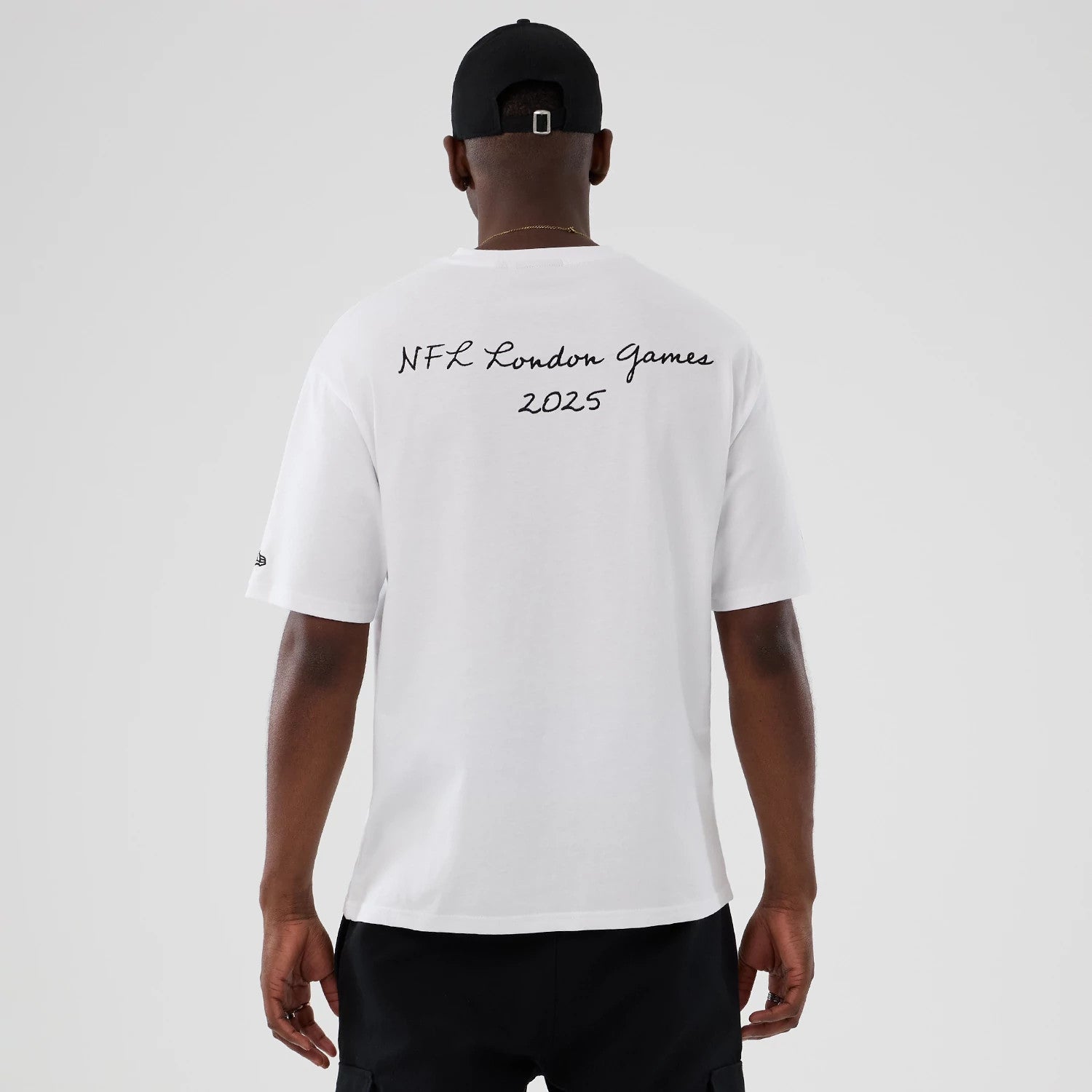 The Male model is wearing LA Rams NFL International Series Games 2025 White Premium T-Shirt 2