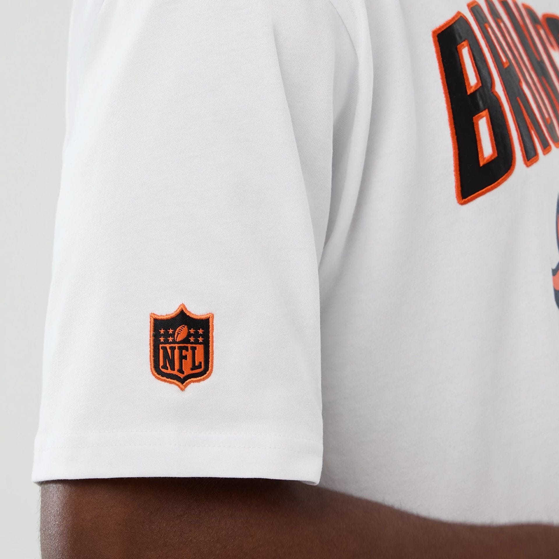 The Male model is wearing Denver Broncos NFL International Series Games 2025 White Premium T-Shirt  5