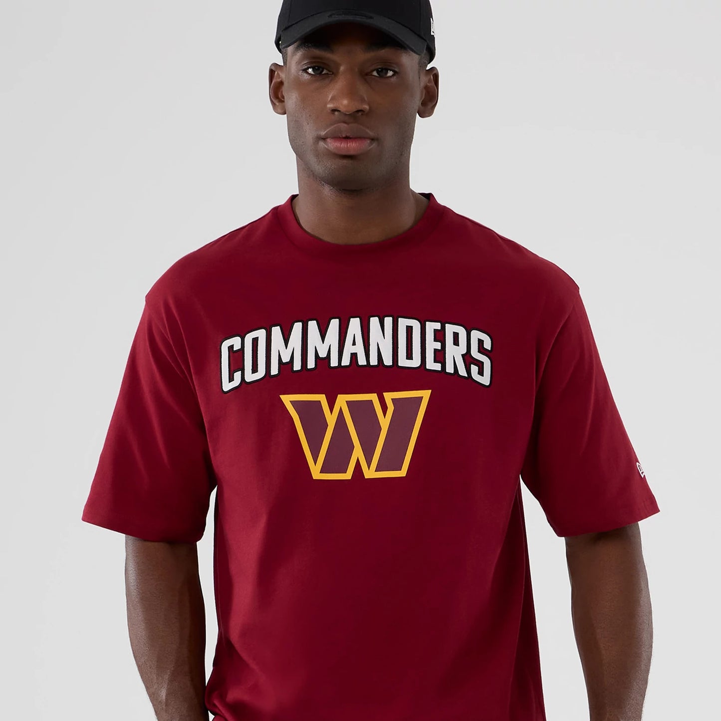 The Male model is wearing Washington Commanders NFL International Series Games 2025 Dark Red Premium T-Shirt 5