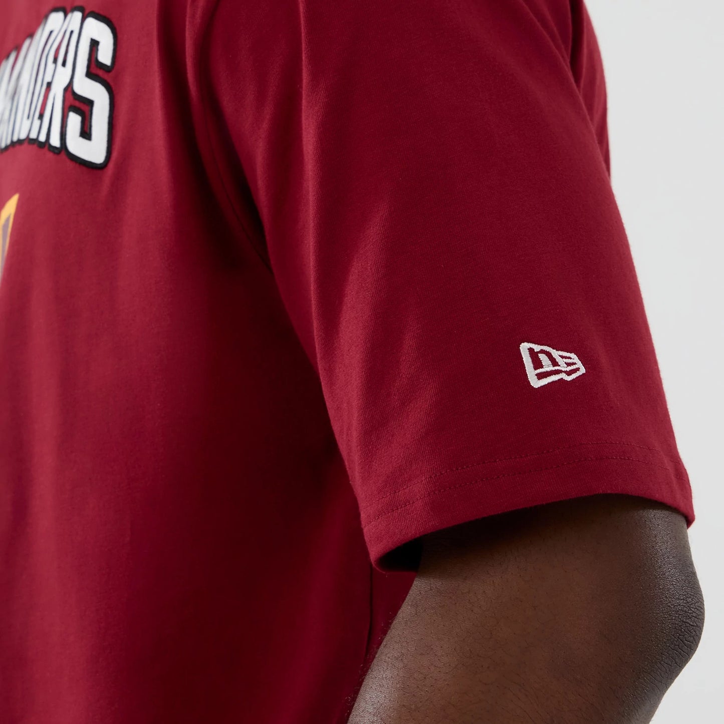 The Male model is wearing Washington Commanders NFL International Series Games 2025 Dark Red Premium T-Shirt 6