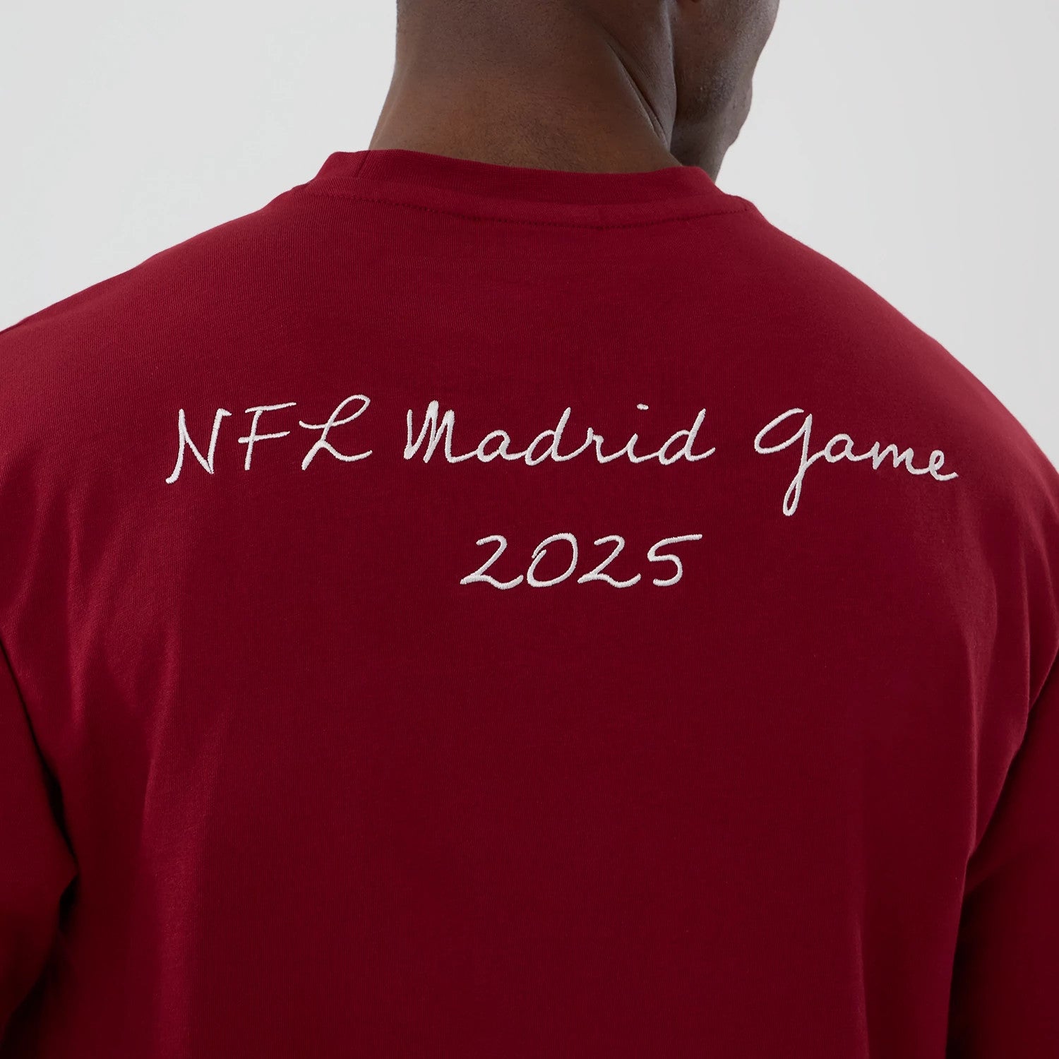 The Male model is wearing Washington Commanders NFL International Series Games 2025 Dark Red Premium T-Shirt 4