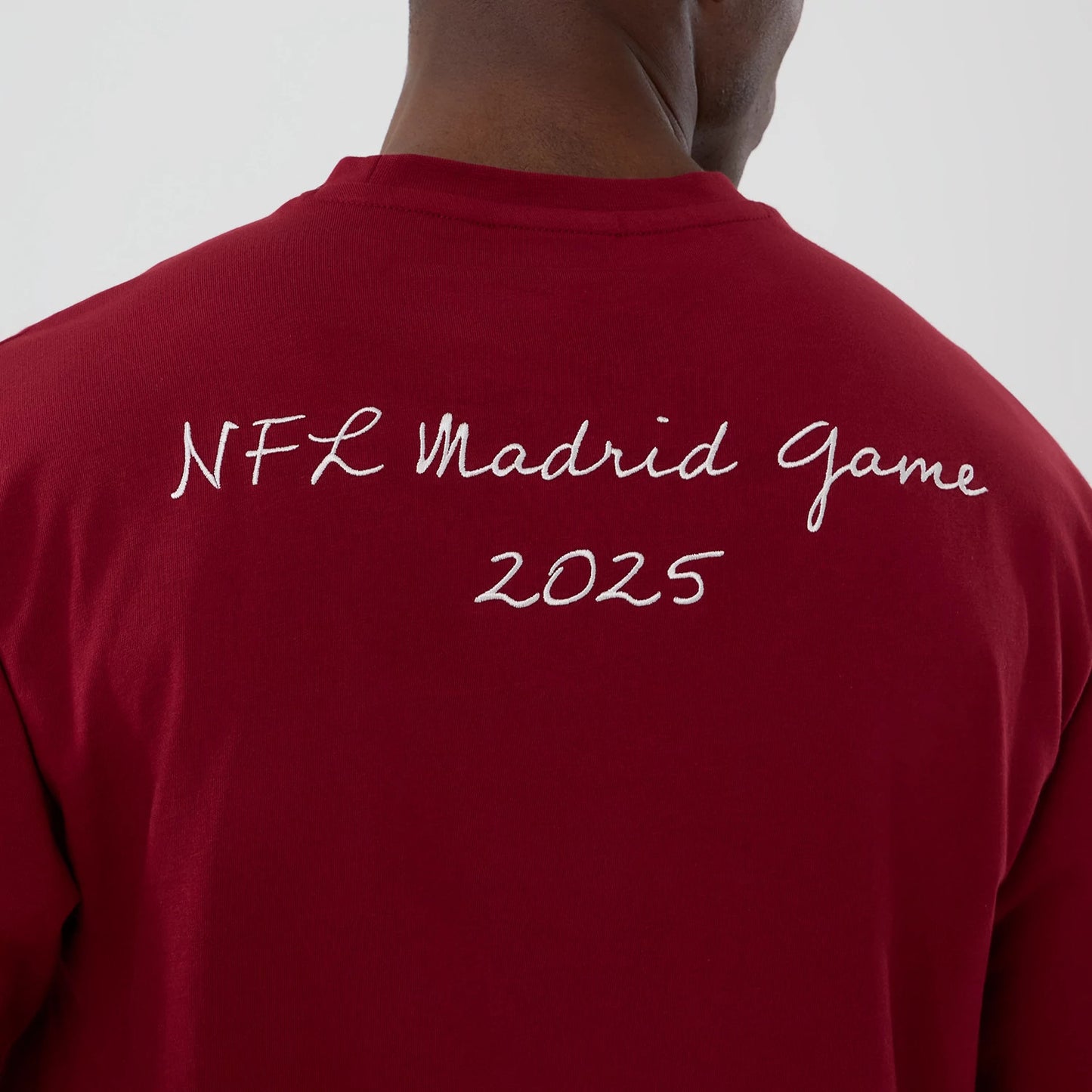 The Male model is wearing Washington Commanders NFL International Series Games 2025 Dark Red Premium T-Shirt 4