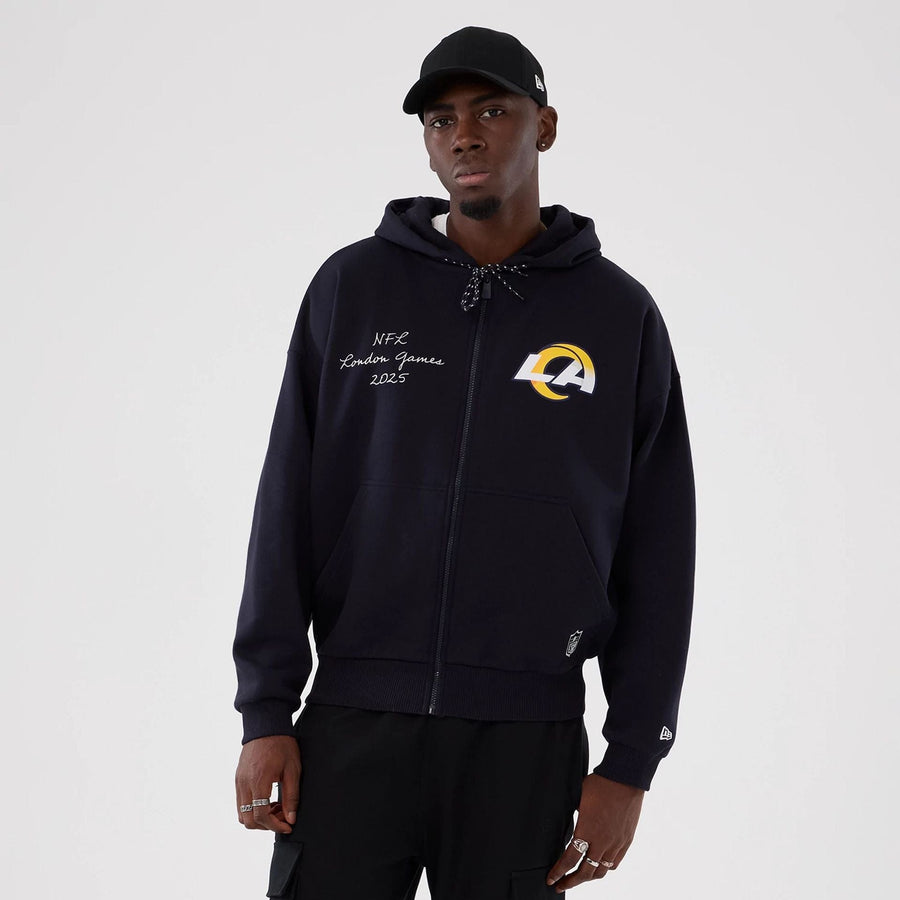 The Male model is wearing LA Rams NFL International Series Games 2025 Navy Premium Pullover Hoodie  1