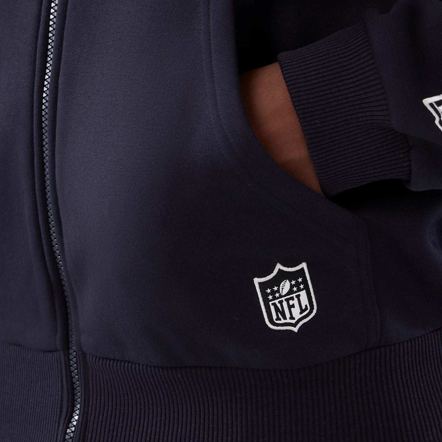 The Male model is wearing Denver Broncos NFL International Series Games 2025 Navy Premium Pullover Hoodie 4