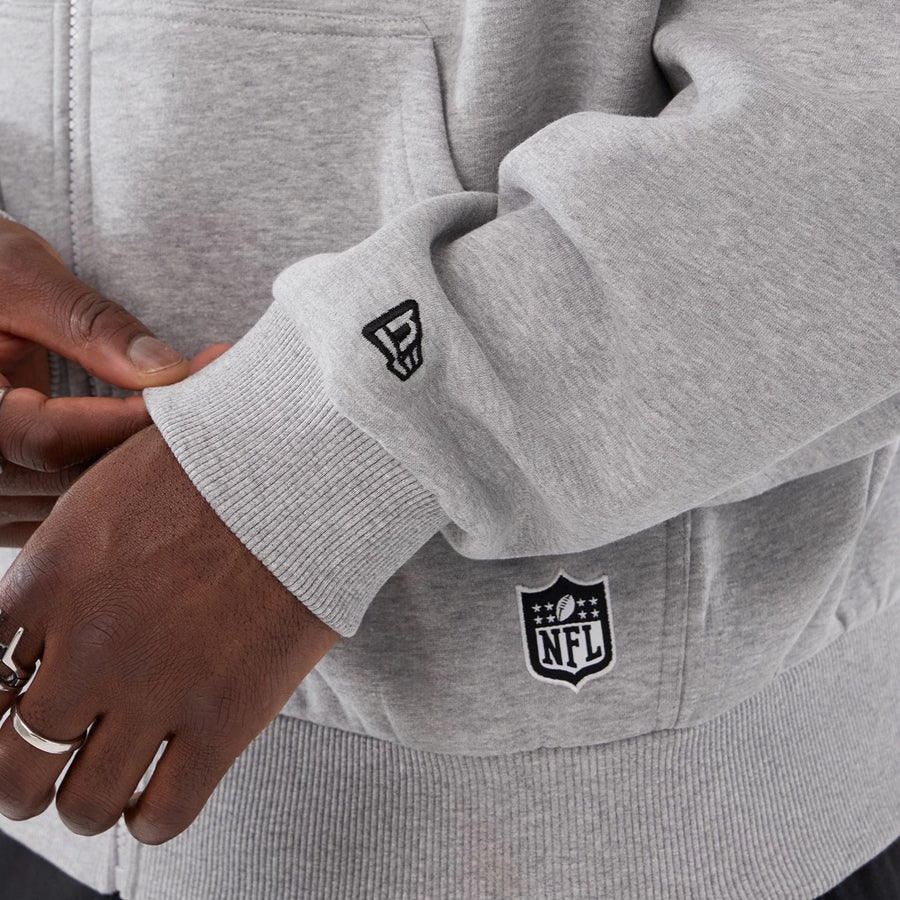 The Male model is wearing Minnesota Vikings NFL International Series Games 2025 Grey Premium Pullover Hoodie  5