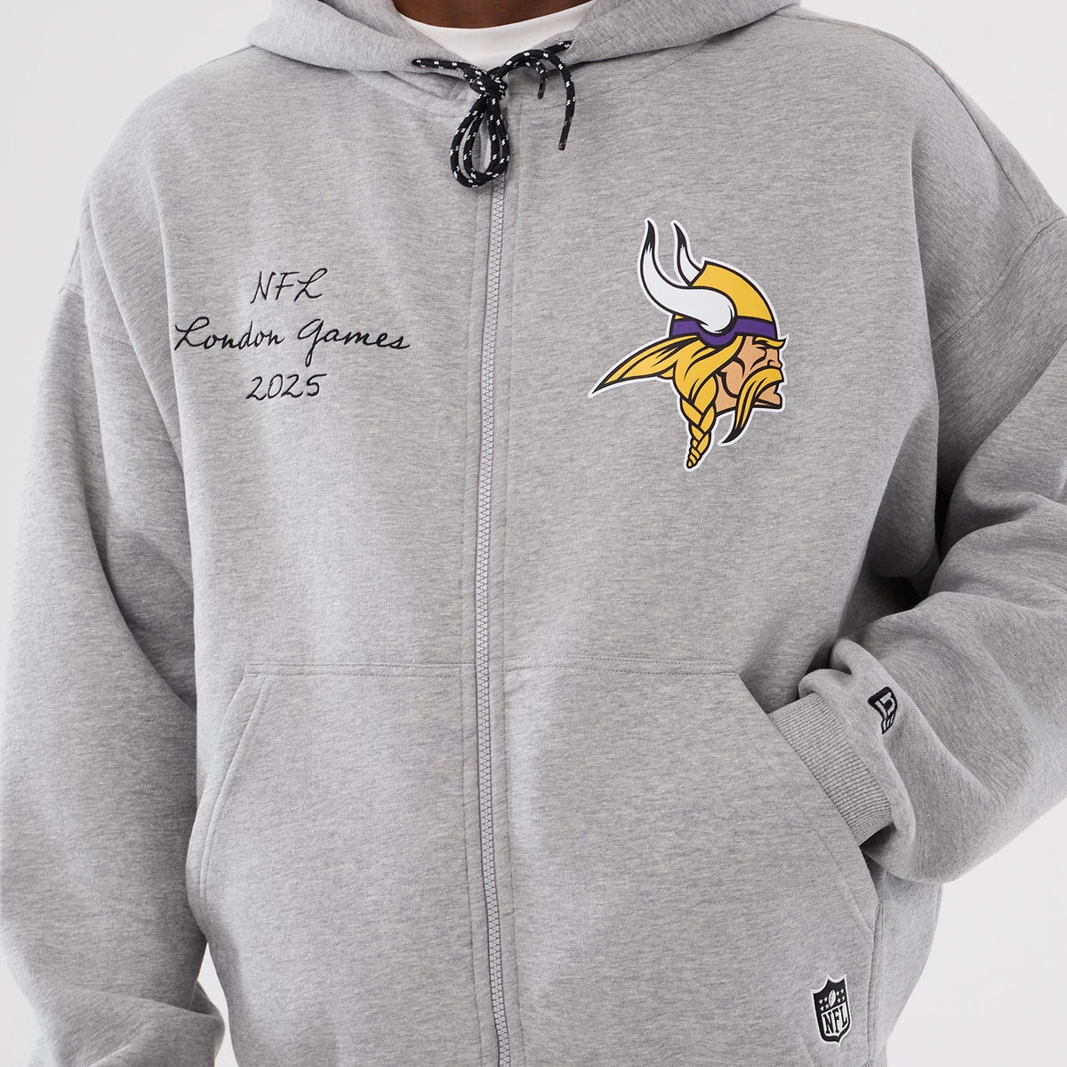 The Male model is wearing Minnesota Vikings NFL International Series Games 2025 Grey Premium Pullover Hoodie 3