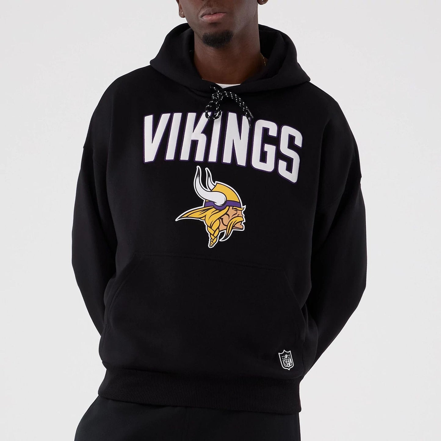 The Male model is wearing Minnesota Vikings NFL International Series Games 2025 Black Premium Pullover Hoodie  3