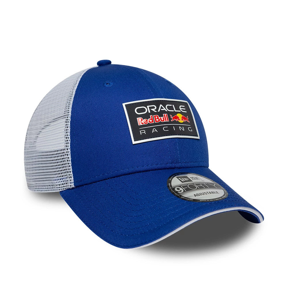Red Bull Racing Dark Blue New Era 9FORTY Adjustable Cap, three-quarter view showing a black embroidered Oracle Red Bull Racing patch on the front panel, contrasted with white mesh side and back panels, and a 9FORTY size sticker on the curved visor.