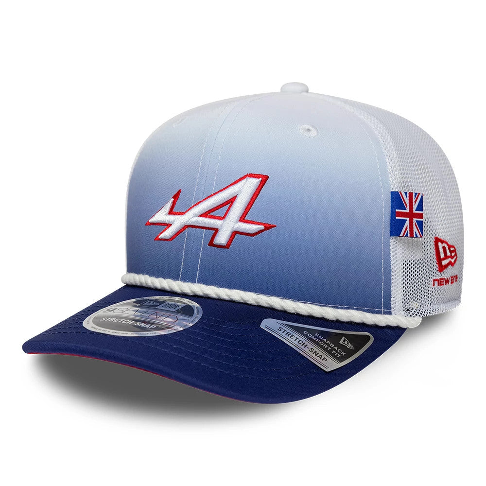 Alpine Racing Silverstone Race Special White New Era 9SEVENTY Stretch Snap Adjustable Cap, three-quarter view with a red embroidered A logo on the gradient blue and white front, navy visor with size sticker, and UK flag on the white mesh side.