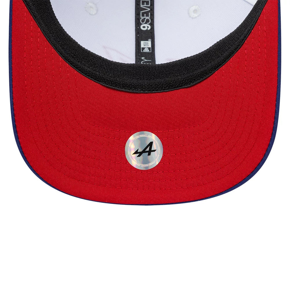 Alpine Racing Silverstone Race Special White New Era 9SEVENTY Stretch Snap Adjustable Cap, inside view showing a red undervisor with an A logo sticker, white sweatband and black taping with New Era and 9SEVENTY branding.