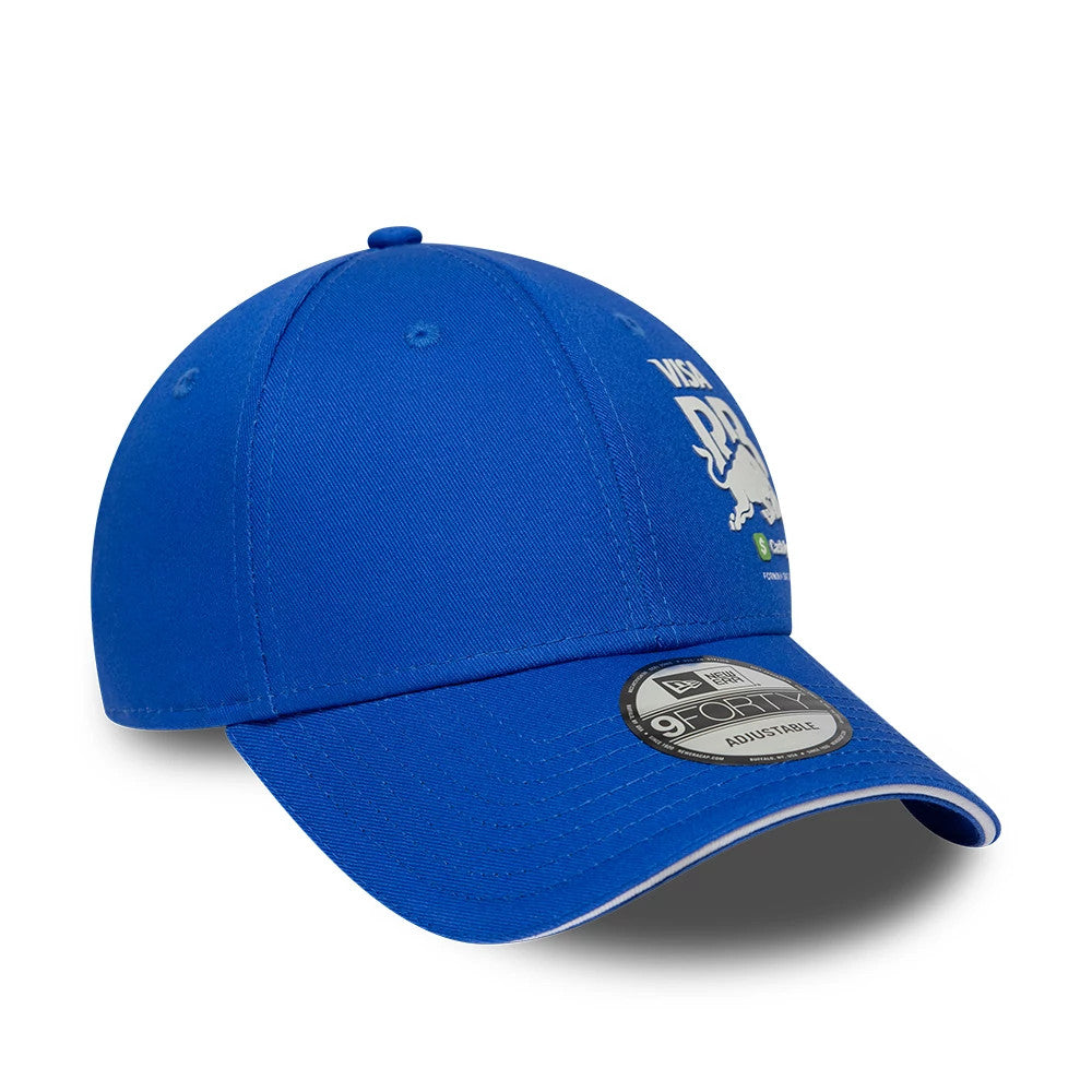 Visa Cash App Racing Bulls Essential Bright Blue New Era 9FORTY Adjustable Cap, three-quarter view with a white embroidered Visa Racing and bull graphics on the front panel, curved visor, and 9FORTY size sticker on the top.