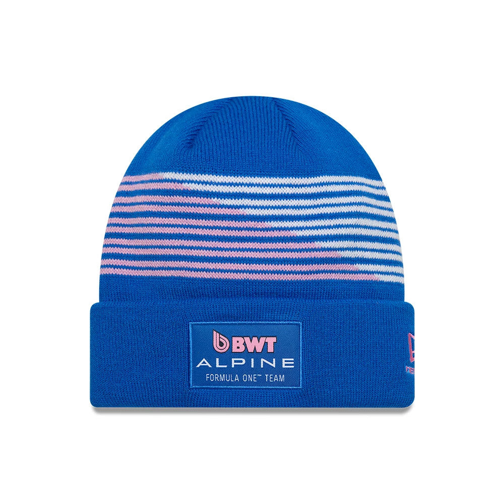 New Era Alpine Racing Pierre Gasly Blue Cuff Knit Beanie Hat, front view featuring a blue cuff with the BWT and Alpine Formula One Team logo patch, and blue and pink striped knit pattern above the cuff.