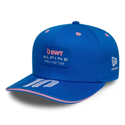 Alpine Racing Pierre Gasly Blue New Era 9SEVENTY Stretch Snap Adjustable Cap, three-quarter view showing the BWT Alpine patch on the front panel, white embroidery on the blue visor, and a raised New Era flag logo on the left side.