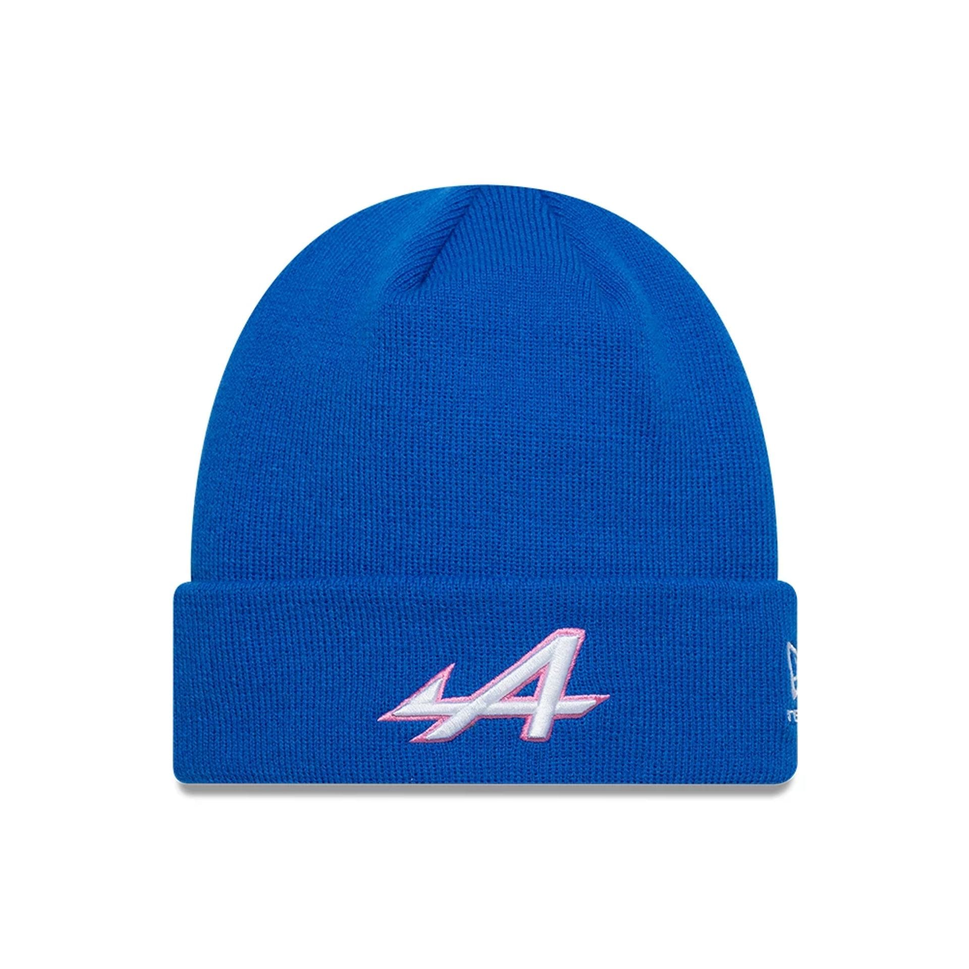 Pictured is this Essential Alpine Racing Cuff Knit Beanie hat in blue. 1