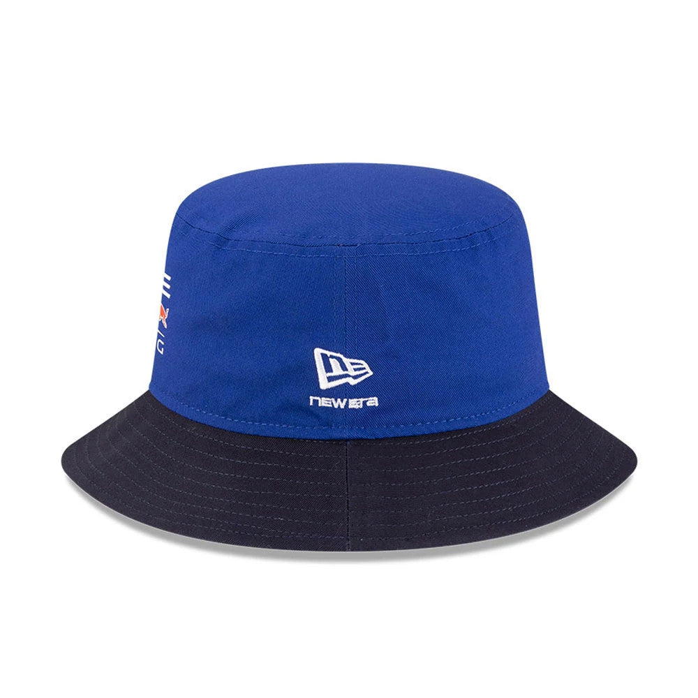 Red Bull Racing Essential Dark Blue New Era Bucket Hat, front view showing the white embroidered New Era flag logo on the dark blue crown and a contrasting black visor with stitching around the edge.