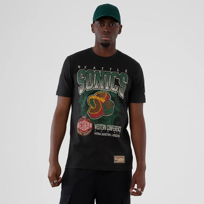 The model is wearing this NBA Hardwood Classic Seattle Supersonics T-Shirt in black. 1