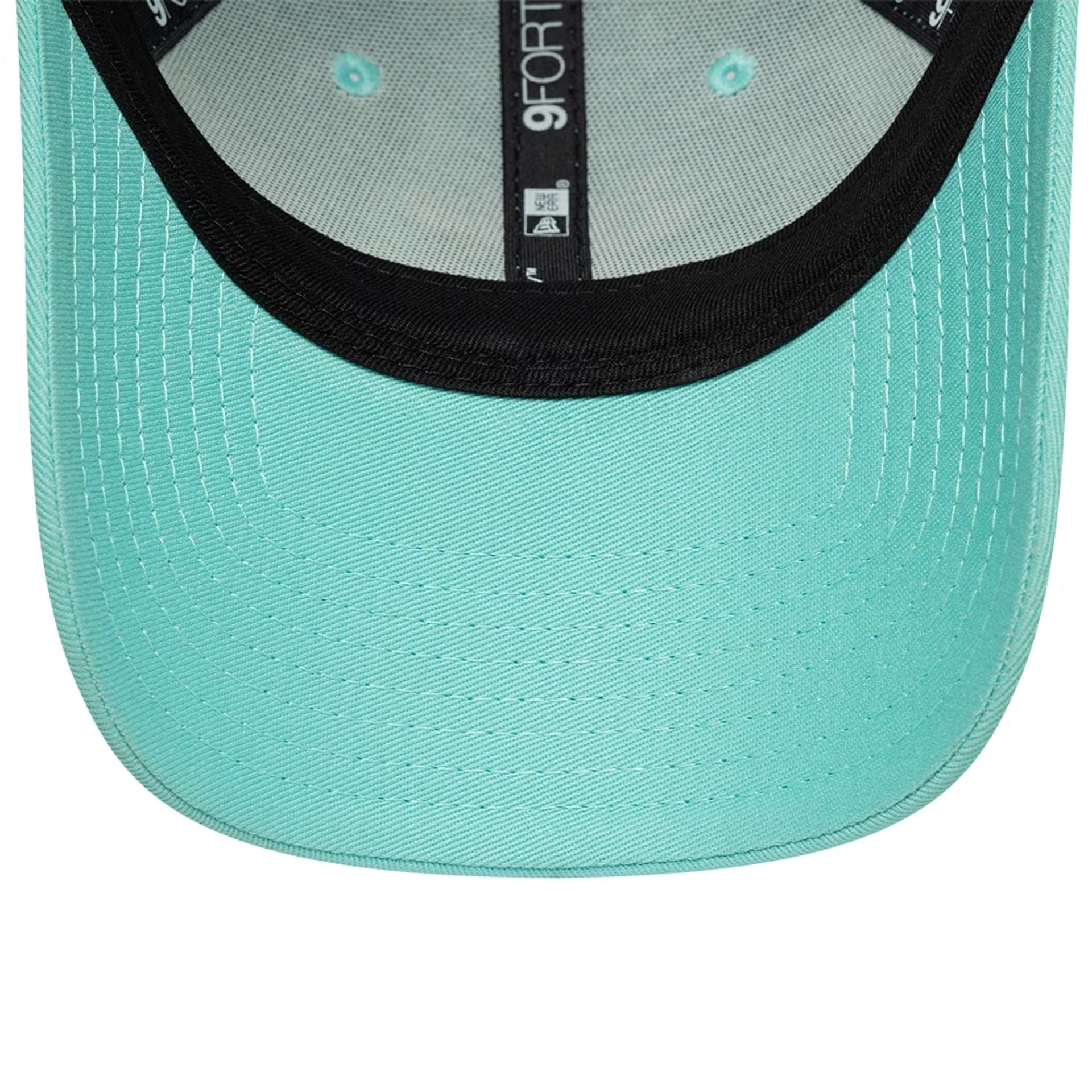 Pictured is this Womens Aston Villa FC 9FORTY cap in turquoise. 5