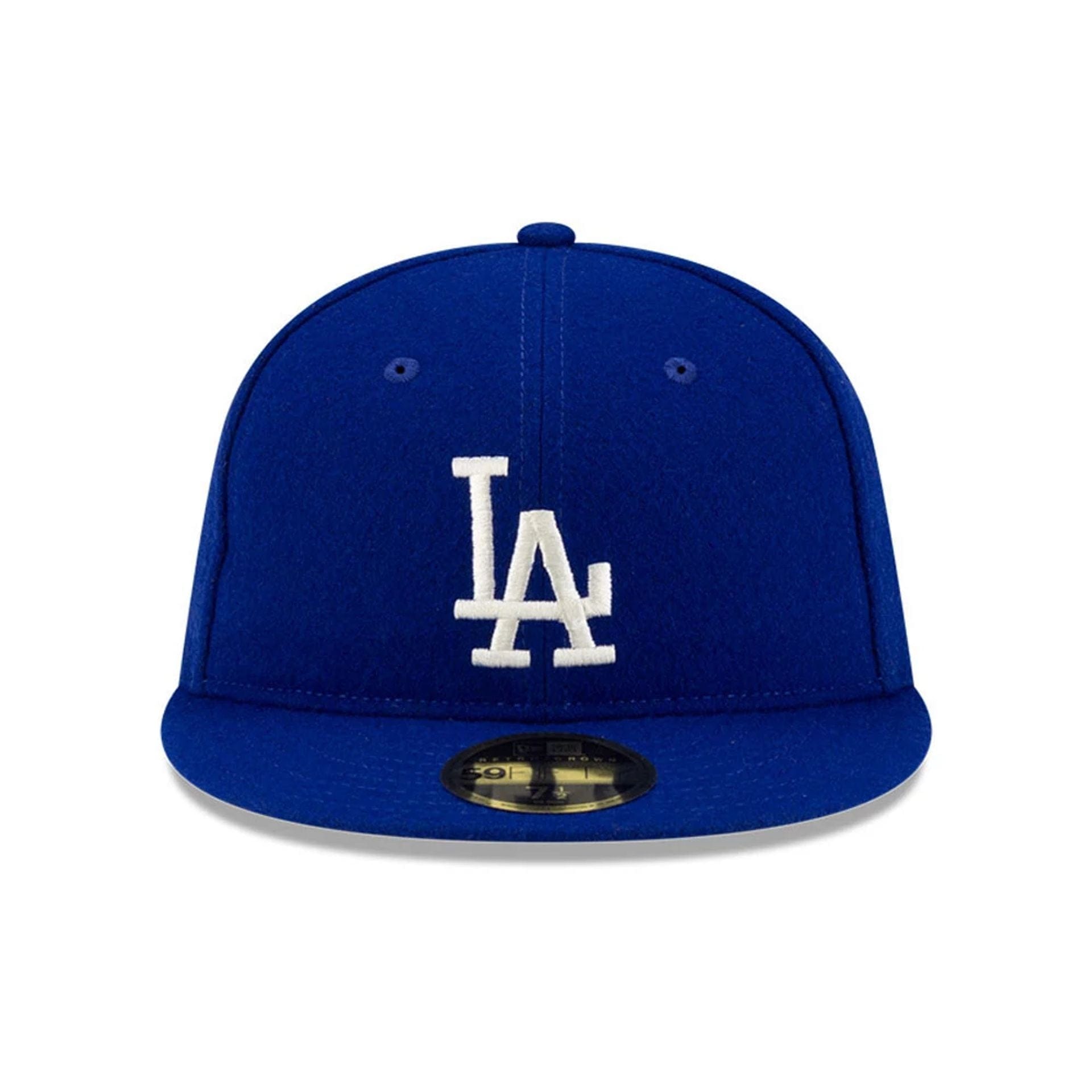Pictured is this FOG X MLB LA Dodgers Retro Crown 59FIFTY Fitted cap in dark blue. 3