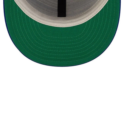 LA Dodgers FOG X MLB Dark Blue Retro Crown New Era 59FIFTY Fitted Cap, inside view showing a dark green undervisor with white stitching and black taping along the panels, complementing the dark blue edge of the visor.