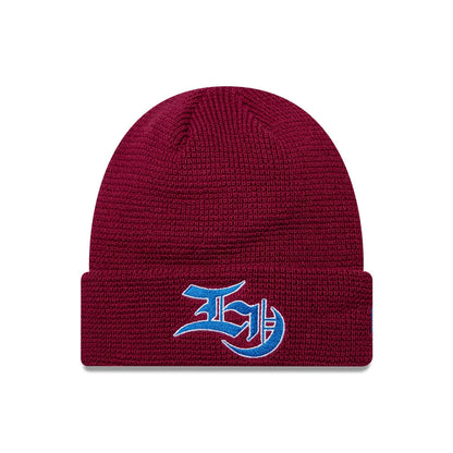 Pictured is this EDWIN x New Era Cuff knit Beanie hat in dark red. 1