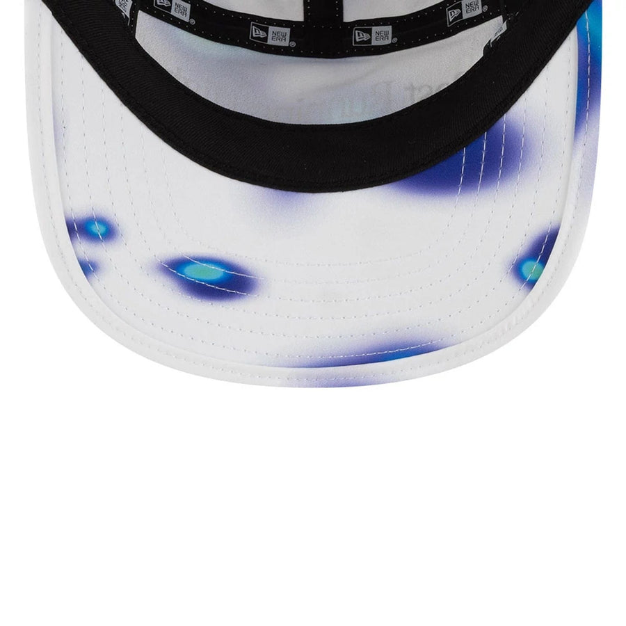 Pictured is this Hermanos Koumori x New Era Camper cap in white. 6