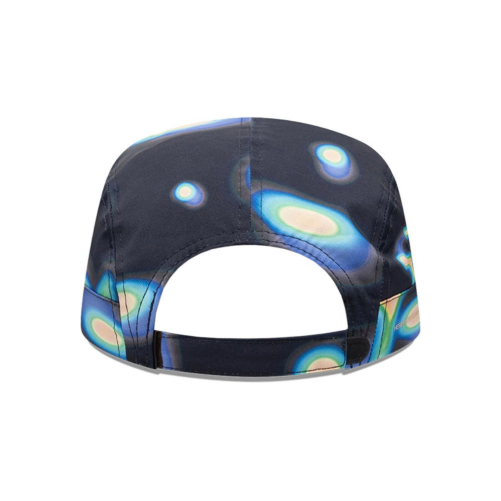 Pictured is this Hermanos Koumori x New Era Camper cap in navy. 5