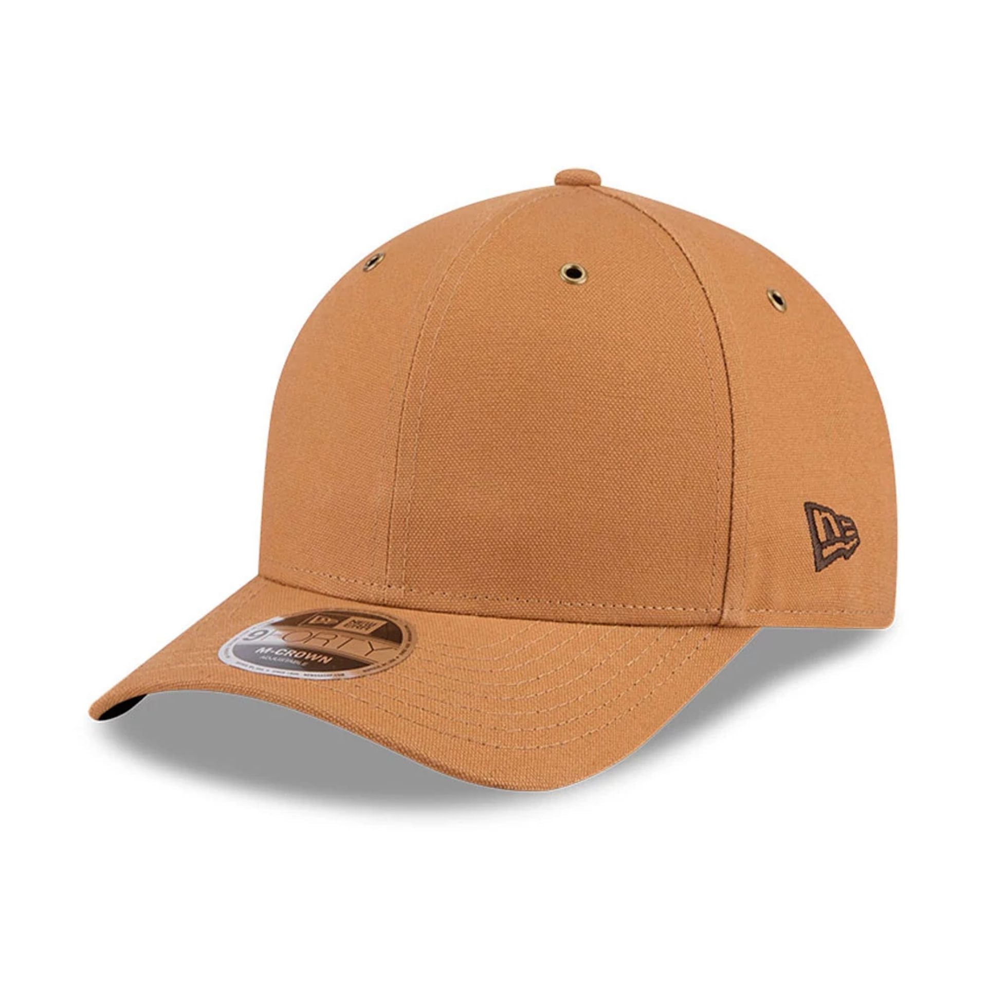 Pictured is this New Era 9FORTY M-Crown cap in beige. 1
