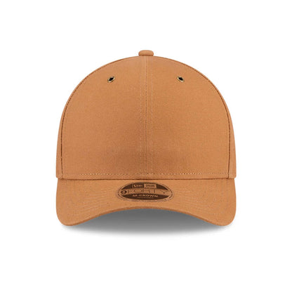 Pictured is this New Era 9FORTY M-Crown cap in beige. 4