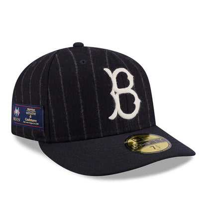 Brooklyn Dodgers MLB X Moon Navy New Era 59FIFTY Fitted Cap, three-quarter view showing a white embroidered Brooklyn B on the front panel, a navy flat visor with a gold 59FIFTY size sticker, and a Moon label on the side.