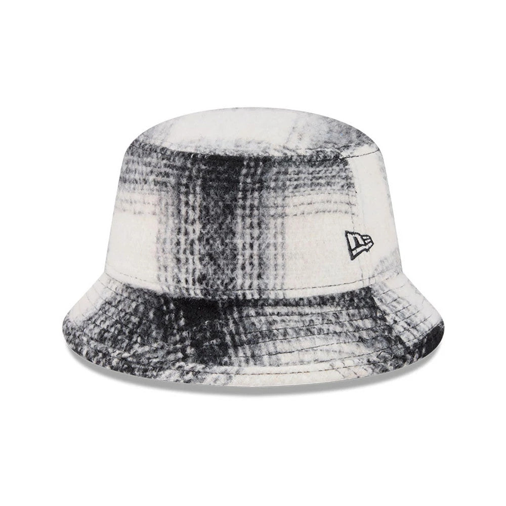 Pictured is this New Era Bucket hat in White & Black Plaid. 1