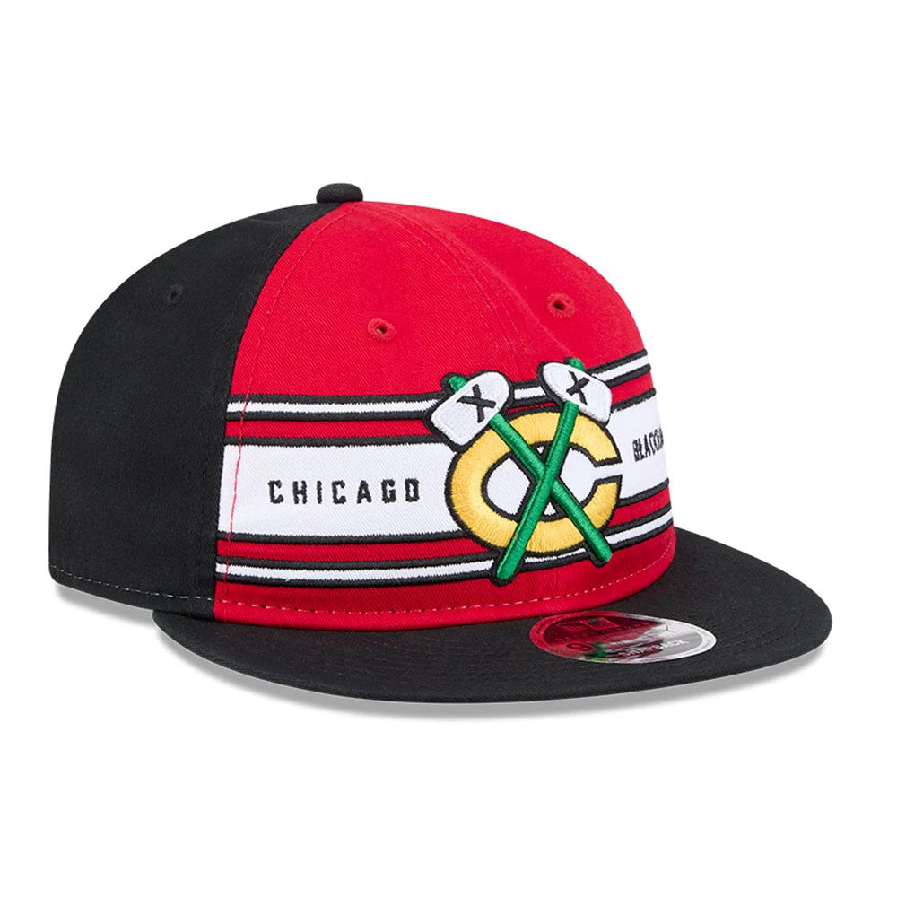 Chicago Blackhawks NHL Team Stripes Red Retro Crown New Era 9FIFTY Adjustable Cap, three-quarter view showing the embroidered team logo on the front panel, with a black flat visor and a 9FIFTY size sticker on the visor.