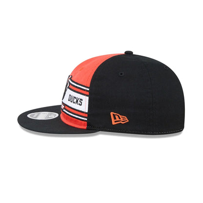 Pictured is this NHL Team Stripes Anaheim Ducks Retro Crown 9FIFTY cap in orange. 5