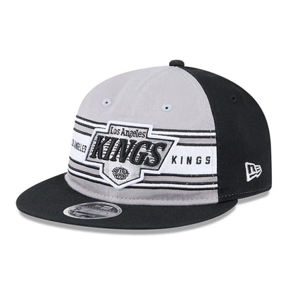 Pictured is this NHL Team Stripes LA Kings Retro Crown 9FIFTY cap in black. 1