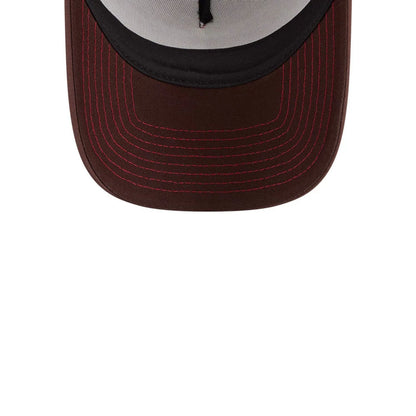 Pictured is this New Era Broken Heart Service & Repair 9FORTY A-Frame Trucker cap in white. 2