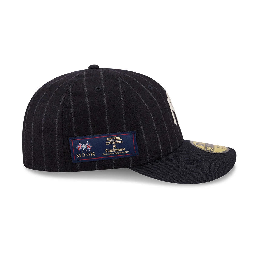 Pictured is this MLB X Moon New York Yankees 59FIFTY Fitted cap in Navy. 5