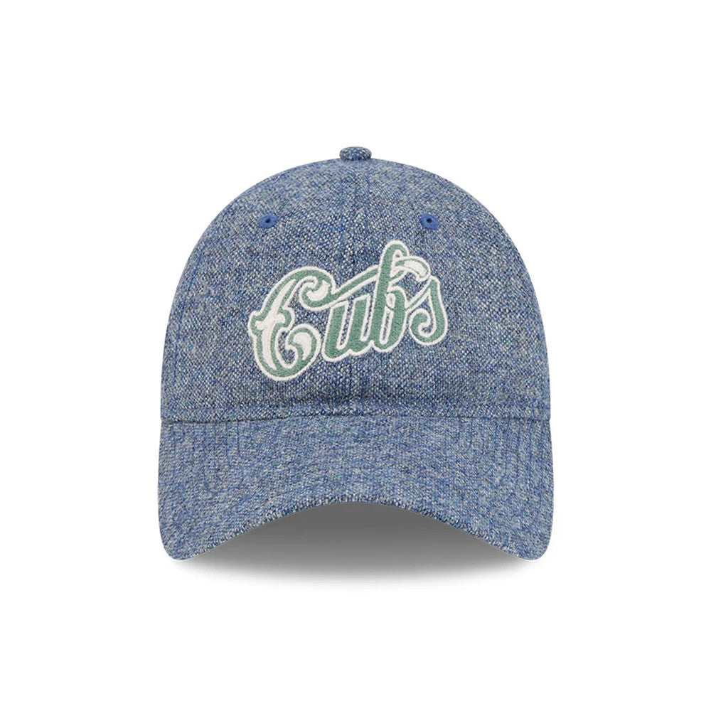 Chicago Cubs MLB X Moon Blue New Era 9TWENTY Adjustable Cap, front view showing the white embroidered Cubs lettering on a blue textured crown with matching blue eyelets and a curved visor.