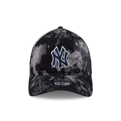 New York Yankees MLB Bleached Denim Black New Era 9TWENTY A-Frame Adjustable Cap, front view showing a white-outlined navy NY logo in raised embroidery on the bleached denim-patterned crown, with a 9TWENTY size sticker on the curved visor.