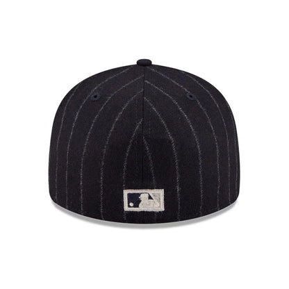 Pictured is this MLB X Moon LA Angels 59FIFTY Fitted cap in Navy. 7