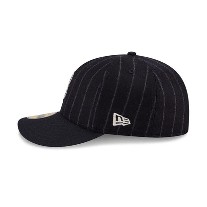 Boston Red Sox MLB X Moon Navy New Era 59FIFTY Fitted Cap, side view featuring the white embroidered New Era flag logo on the left side with a navy pinstriped crown and a navy visor.